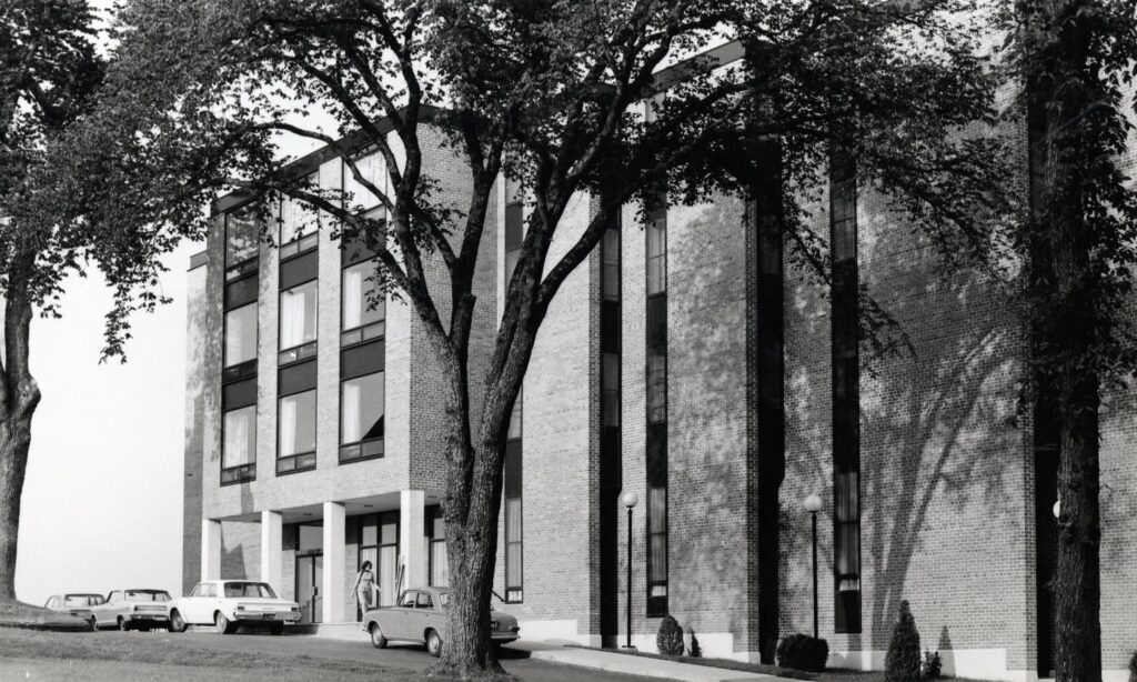 An archival photo of an elm tree outside Windsor Hall.
