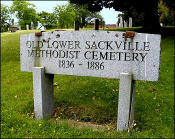 An inscribed stone sign marks the Old Lower Sackville Methodist Cemetery